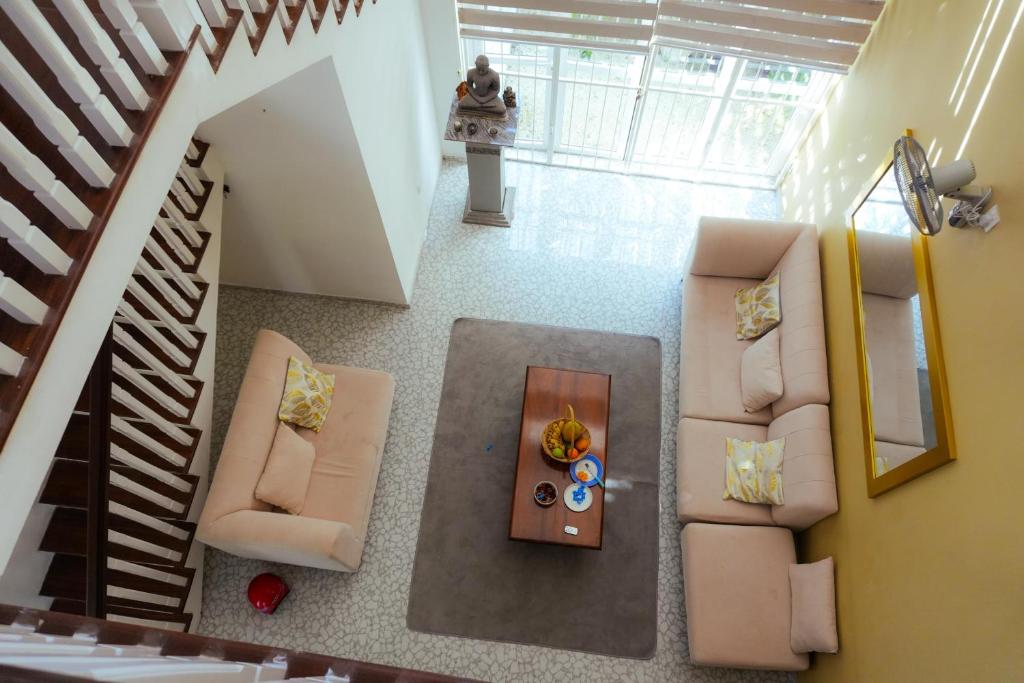 Posezení v ubytování Spacious Eco House with Garden and Scenic Paddy View Colombo