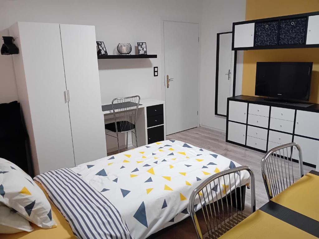 Postel nebo postele na pokoji v ubytování PRIMUS mini room