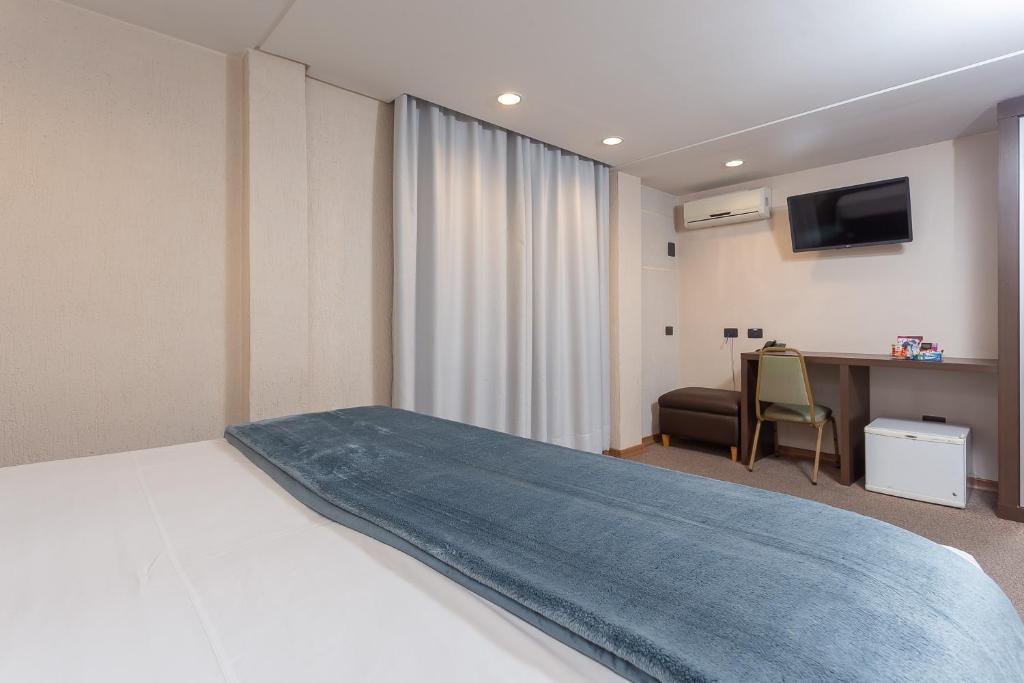 Cama ou camas em um quarto em Roochelle Hotel by Nobile