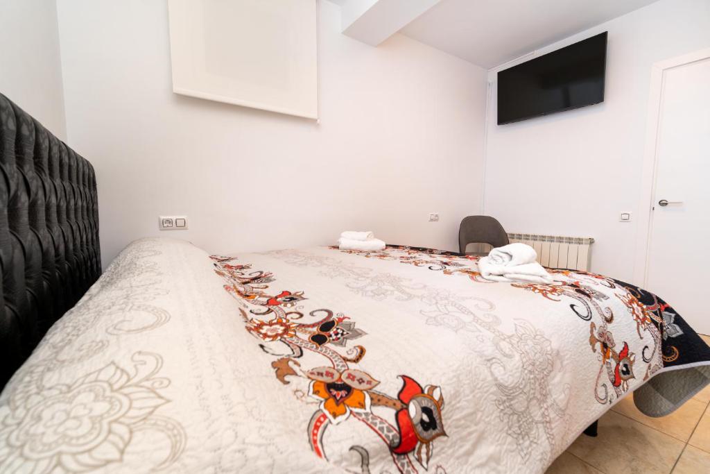 Postel nebo postele na pokoji v ubytování Casa Ianco &Rares