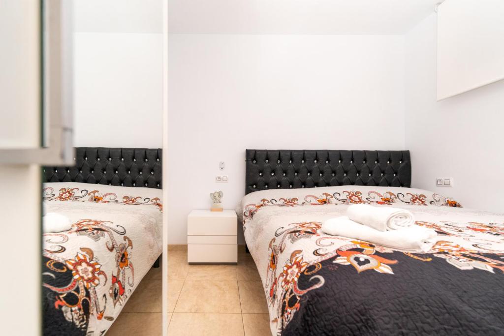 Postel nebo postele na pokoji v ubytování Casa Ianco &Rares