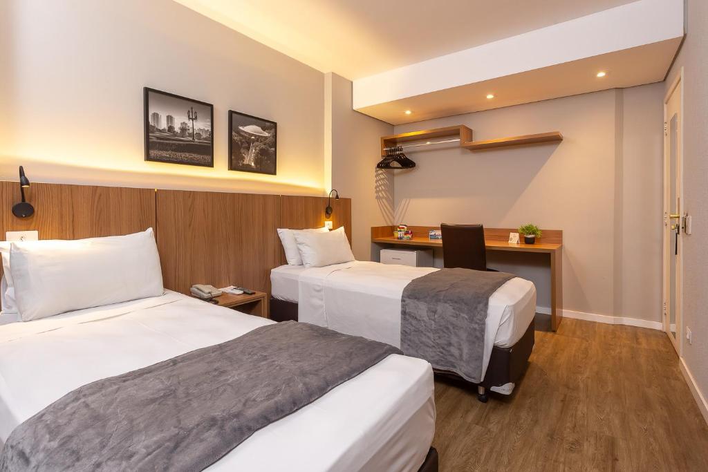 Cama ou camas em um quarto em Roochelle Hotel by Nobile