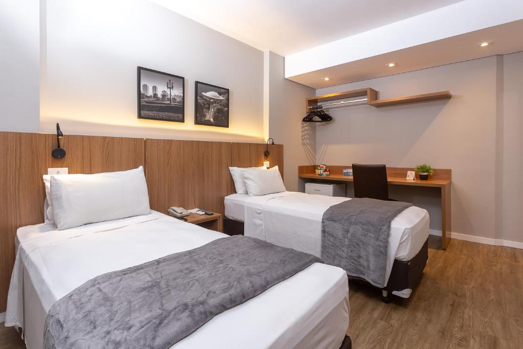 Cama ou camas em um quarto em Roochelle Hotel by Nobile