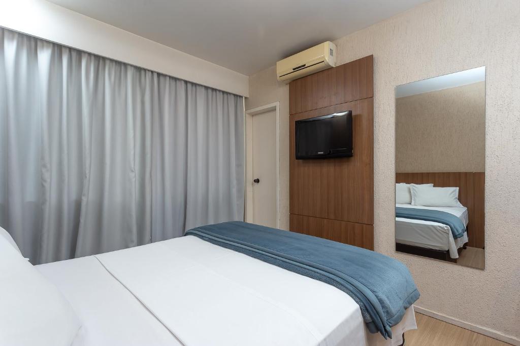 Cama ou camas em um quarto em Roochelle Hotel by Nobile