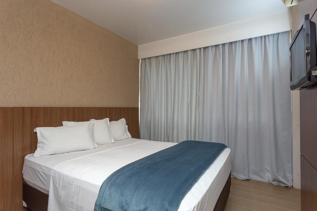 Cama ou camas em um quarto em Roochelle Hotel by Nobile