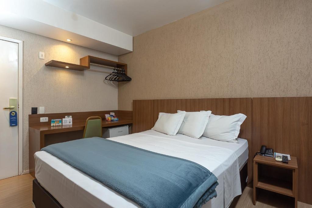 Cama ou camas em um quarto em Roochelle Hotel by Nobile