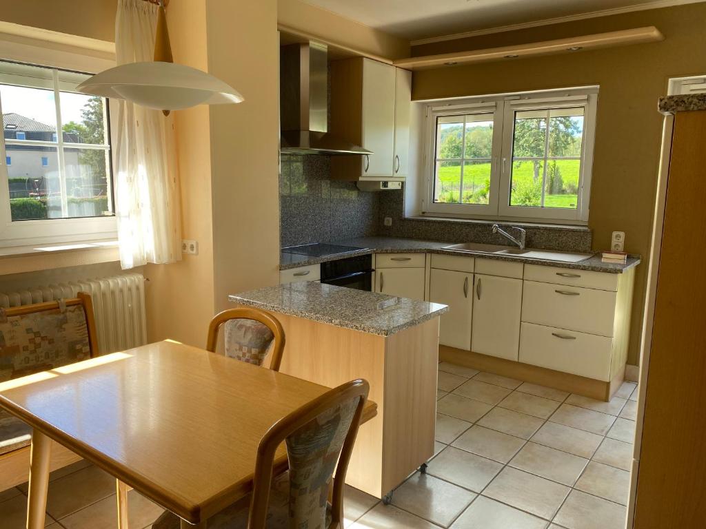 Kuchyň nebo kuchyňský kout v ubytování Maison Riz Royal