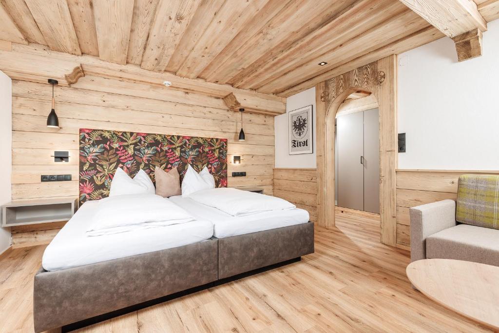 Postel nebo postele na pokoji v ubytování Hotel Landgasthof Gappen