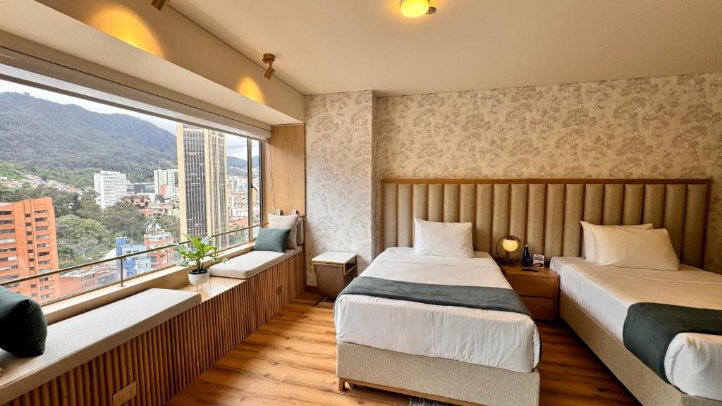 Postel nebo postele na pokoji v ubytování Tequendama Suites Bogota