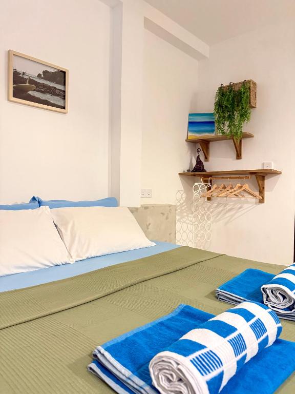 Postel nebo postele na pokoji v ubytování Sri Lanka Surf Villa Domus Graziella