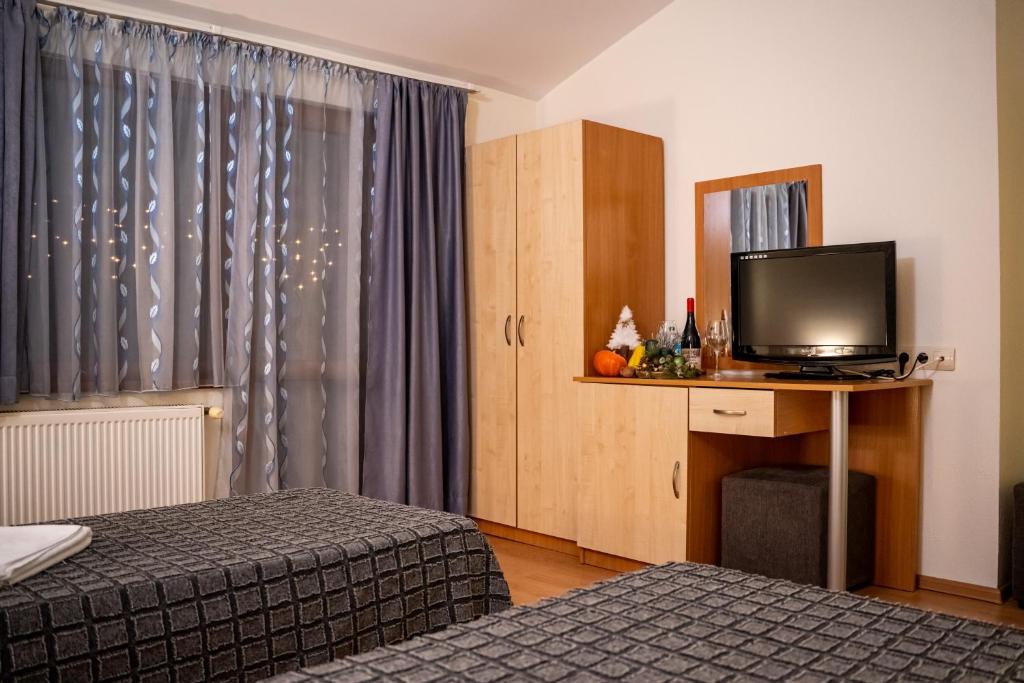 Postel nebo postele na pokoji v ubytování Matsurev Han