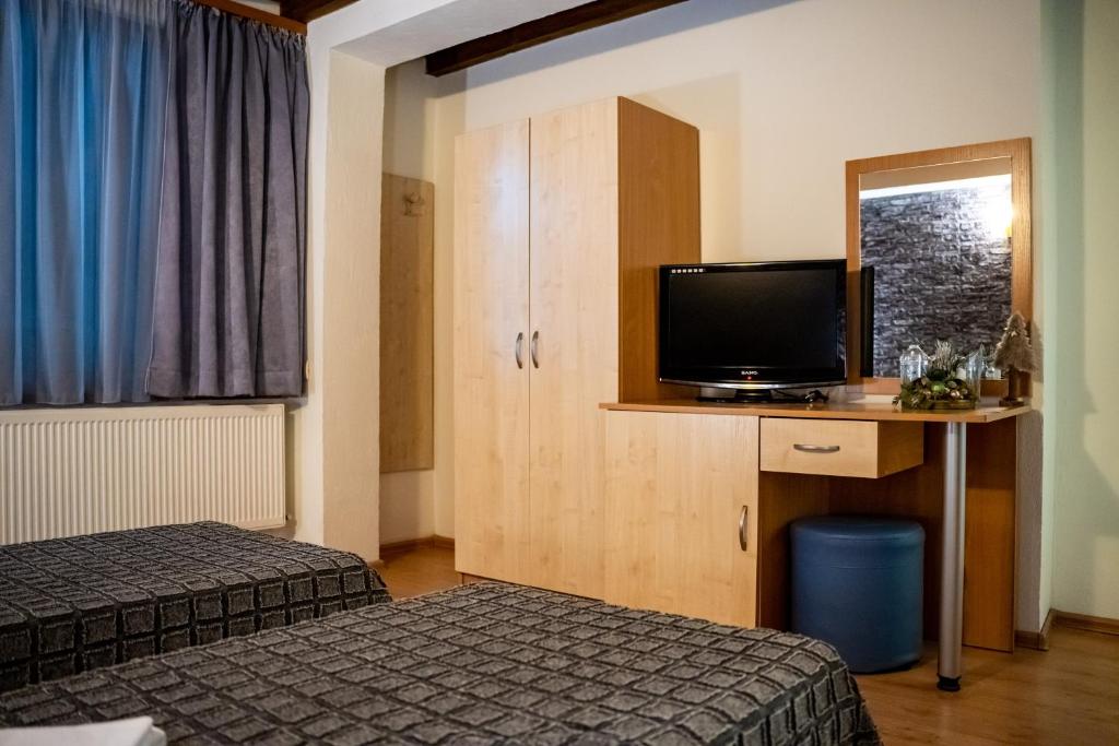 Postel nebo postele na pokoji v ubytování Matsurev Han