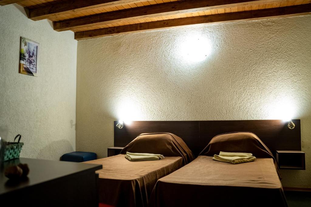 Postel nebo postele na pokoji v ubytování Matsurev Han