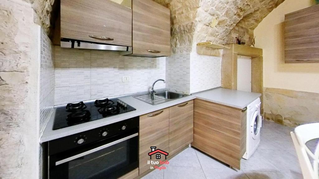 A kitchen or kitchenette at Just Music House bnb,typical,15min airport & beach