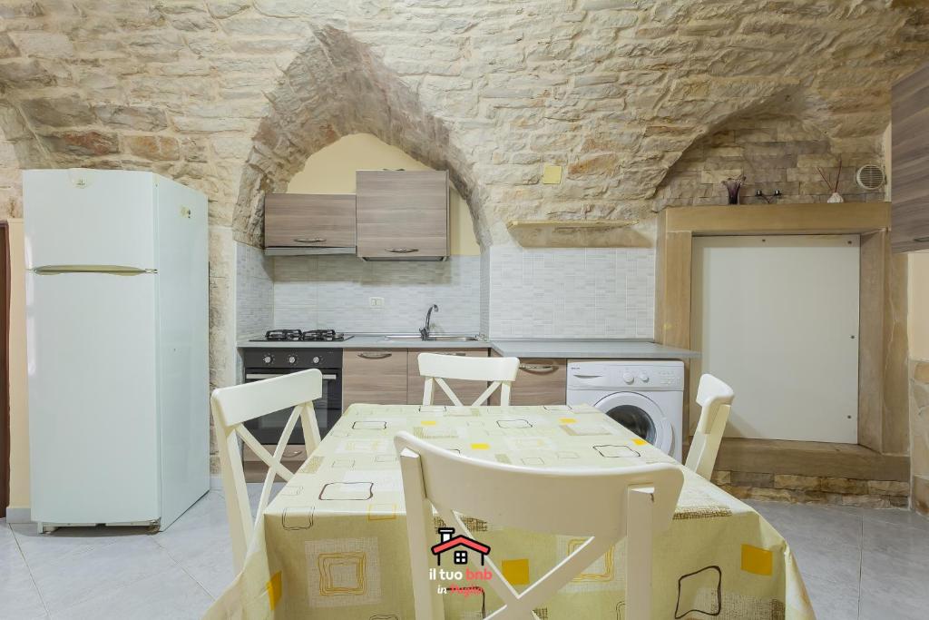 A kitchen or kitchenette at Just Music House bnb,typical,15min airport & beach