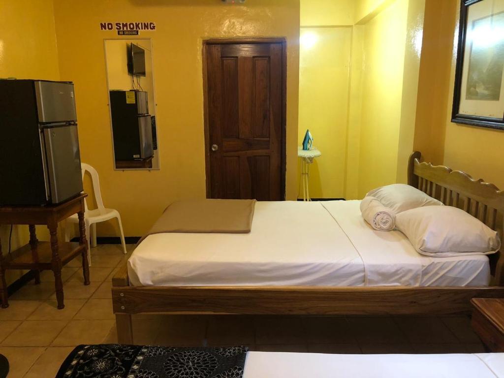 Postel nebo postele na pokoji v ubytování Chaleanor Hotel