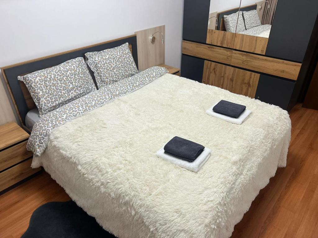 Postel nebo postele na pokoji v ubytování VIP Apartment Belvedere Club