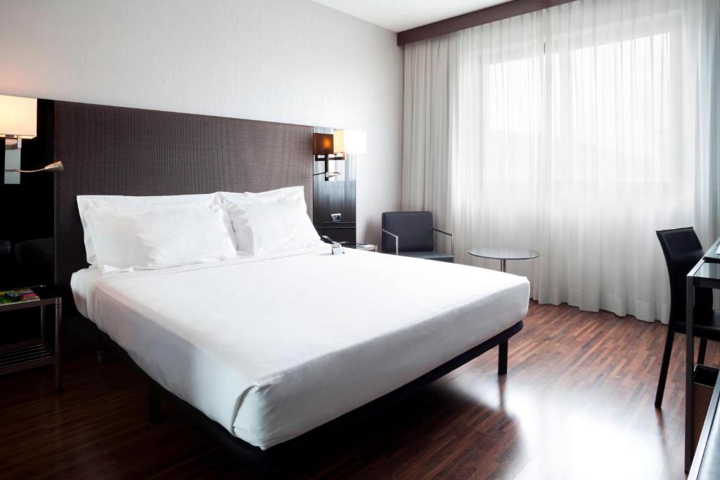 Postel nebo postele na pokoji v ubytování AC Hotel Brescia by Marriott