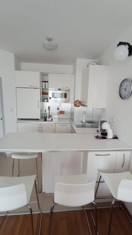 Kuchyň nebo kuchyňský kout v ubytování VIP Apartment Belvedere Club