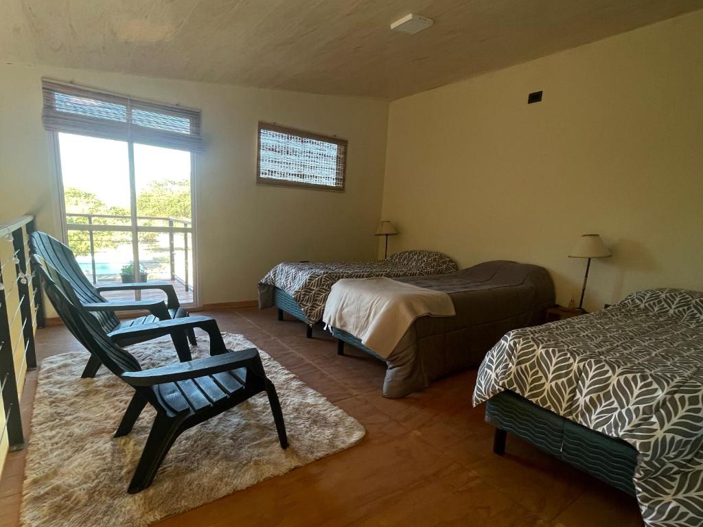 Postel nebo postele na pokoji v ubytování La Sietecolores