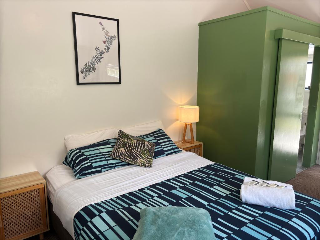 Letto o letti in una camera di Peppertree Lodge