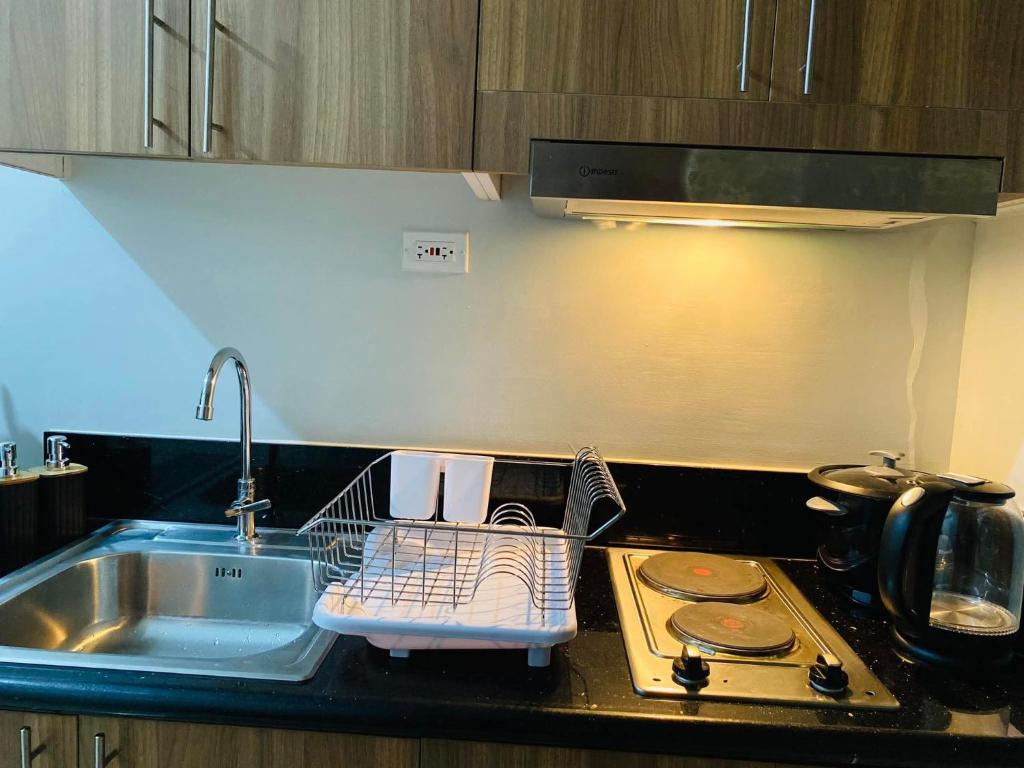 Kuchyň nebo kuchyňský kout v ubytování SMDC Shore 3 Residences