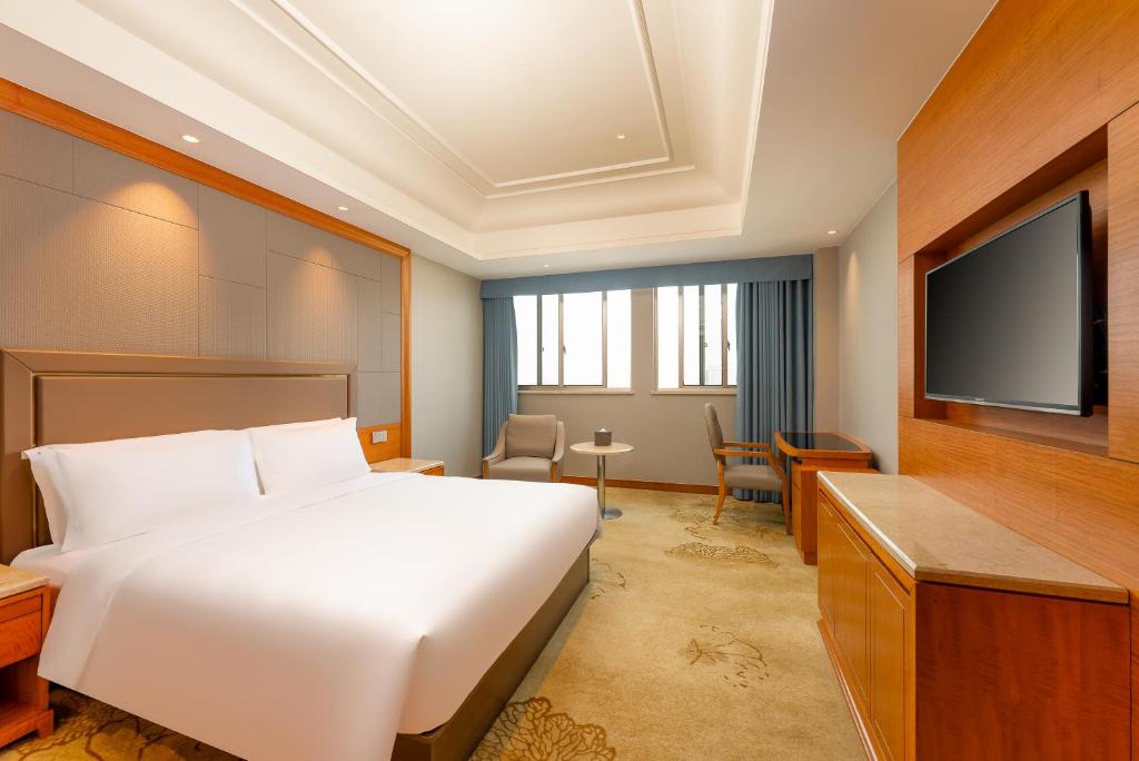TV a/nebo společenská místnost v ubytování 上海戴斯温德姆酒店 Shanghai Days Wyndham Hotel