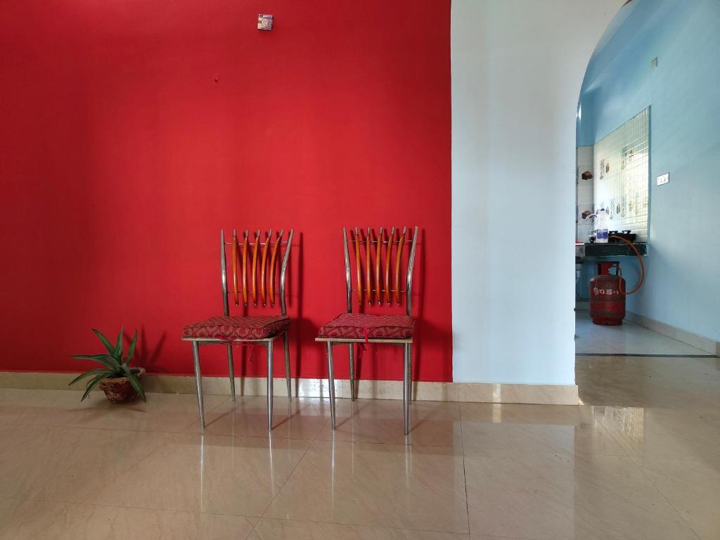 Posezení v ubytování Tales of Guwahati IV 1BHK - AC extra 200