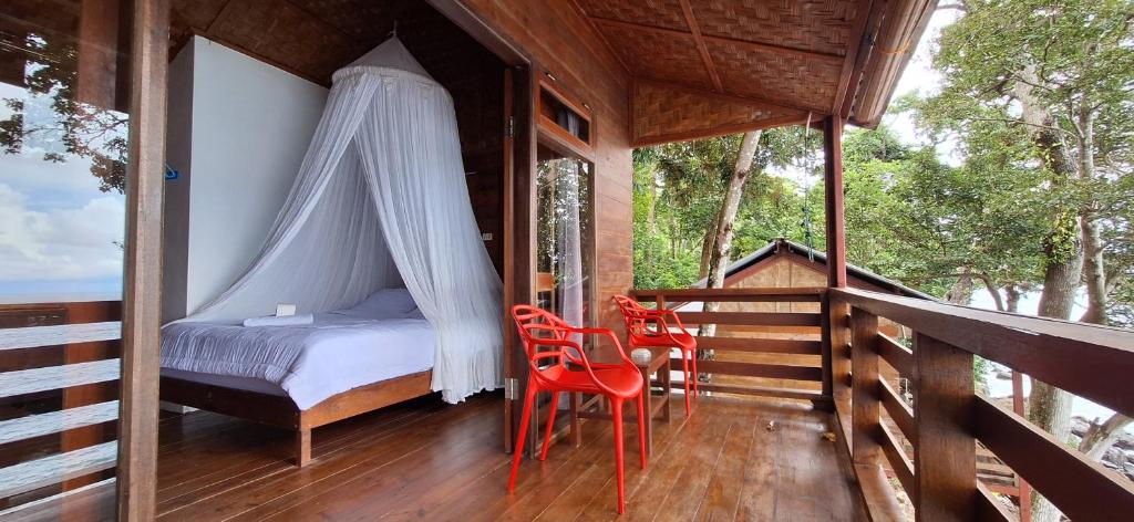 Balkón nebo terasa v ubytování Treetop Guesthouse and Bungalows