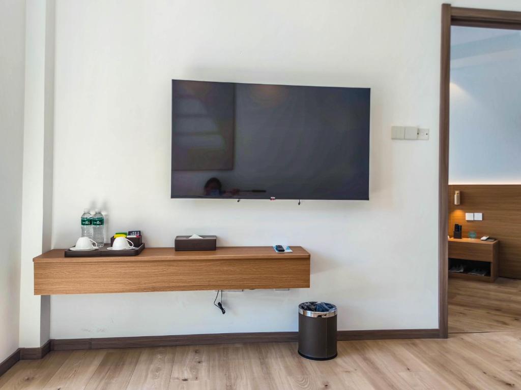 TV a/nebo společenská místnost v ubytování 浮生慢遇酒店