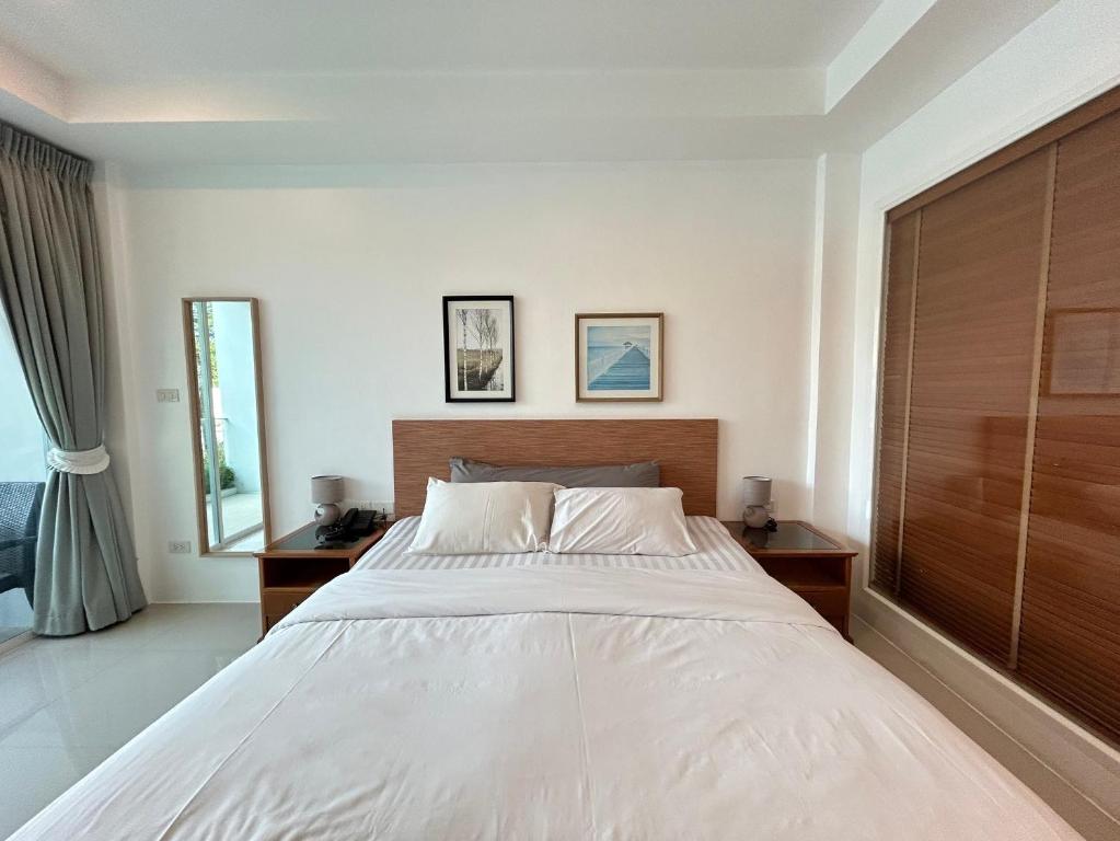 Postel nebo postele na pokoji v ubytování Clear House Resort - SHA Extra Plus