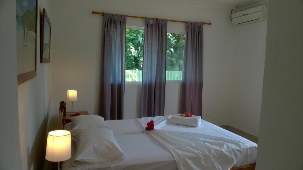 Postel nebo postele na pokoji v ubytování Villas Idea