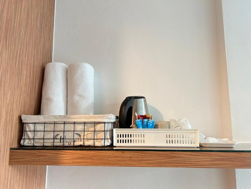 Příslušenství pro přípravu čaje a kávy v ubytování Clear House Resort - SHA Extra Plus