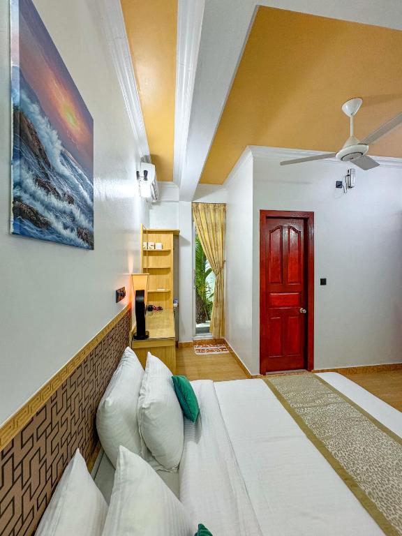 Postel nebo postele na pokoji v ubytování Sevinex Inn