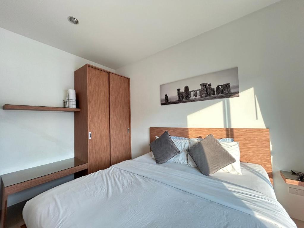 Postel nebo postele na pokoji v ubytování Clear House Resort - SHA Extra Plus