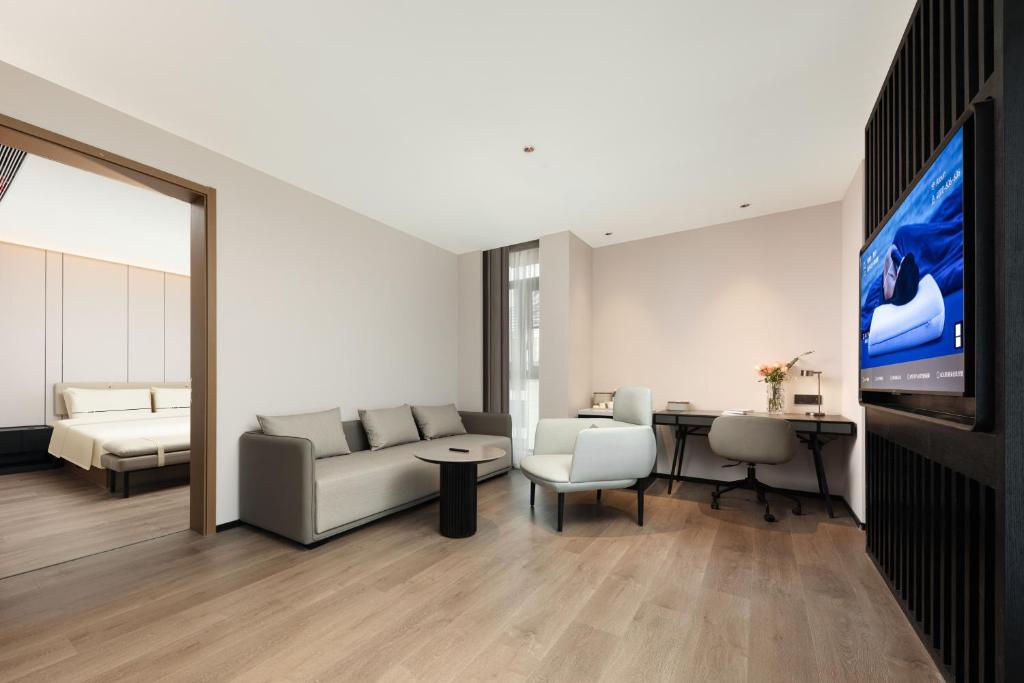 Posezení v ubytování Atour Hotel Wuxi Taikeyuan Zhenze Road
