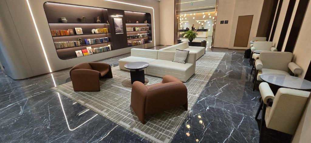Posezení v ubytování Atour Hotel Wuxi Taikeyuan Zhenze Road