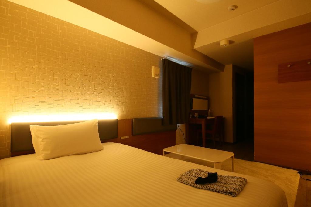 Postel nebo postele na pokoji v ubytování Hotel Trad