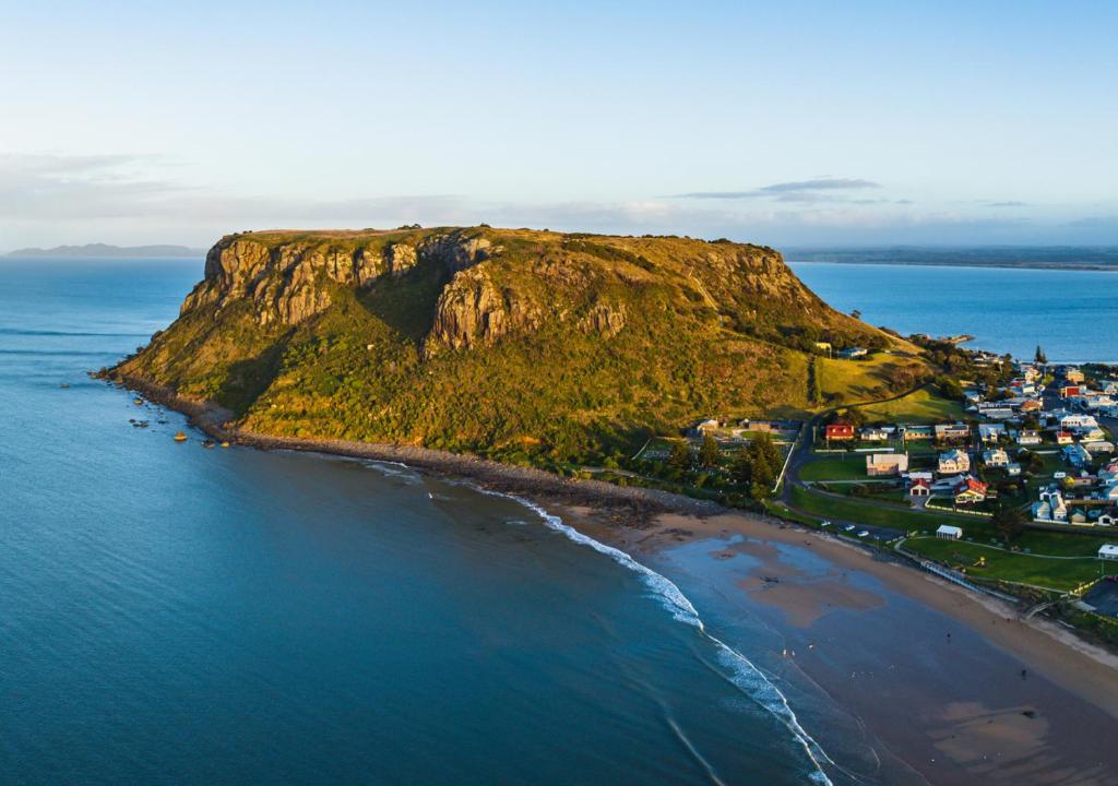an aerial view of a small island in the ocean at Stanley Heritage House in Stanley