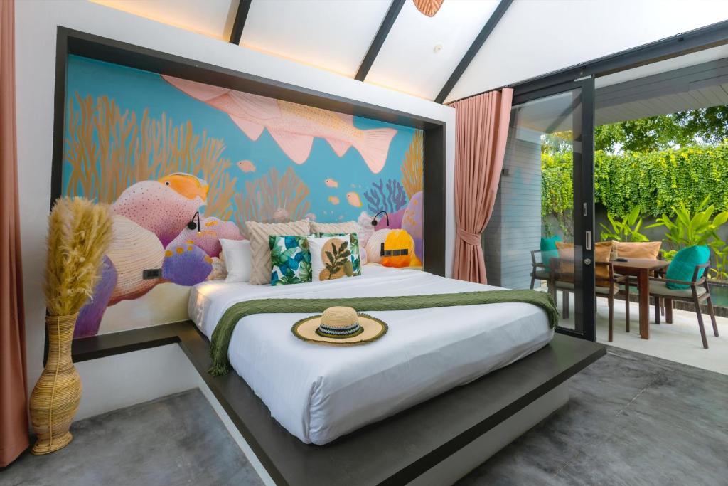 Postel nebo postele na pokoji v ubytování Tolani Resort Koh Samui