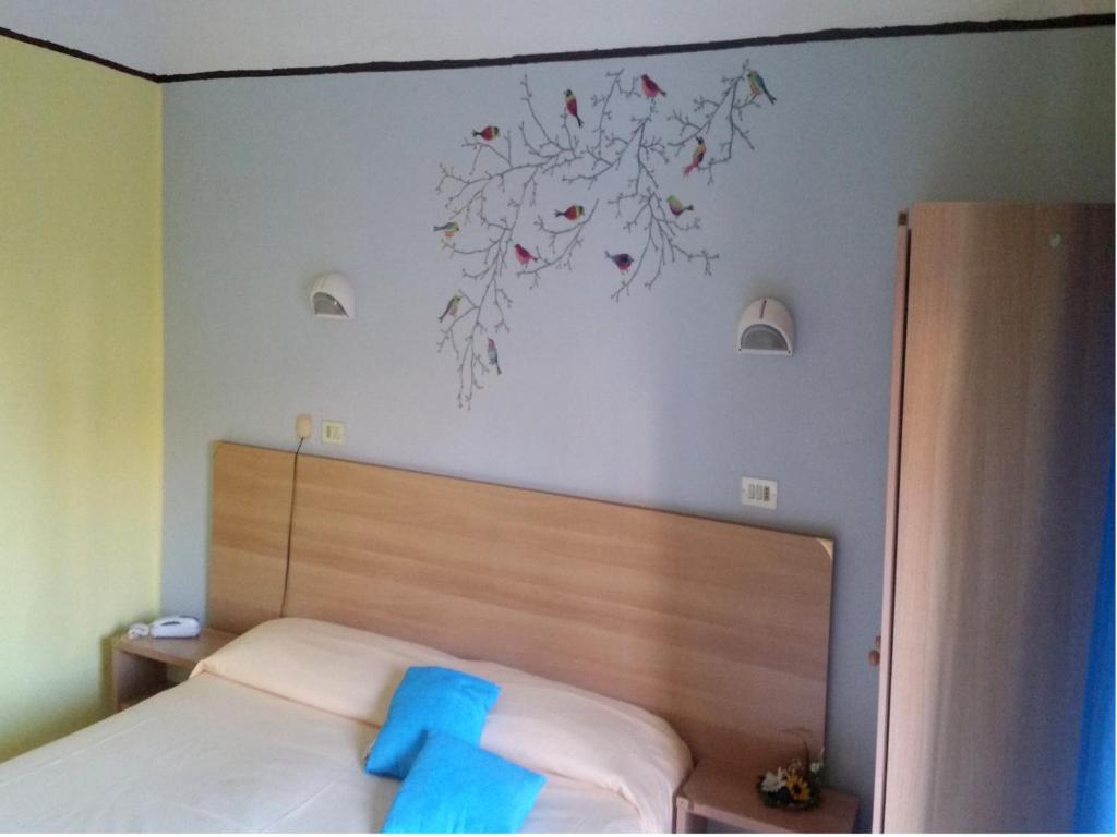 Postel nebo postele na pokoji v ubytování Hotel Stazione