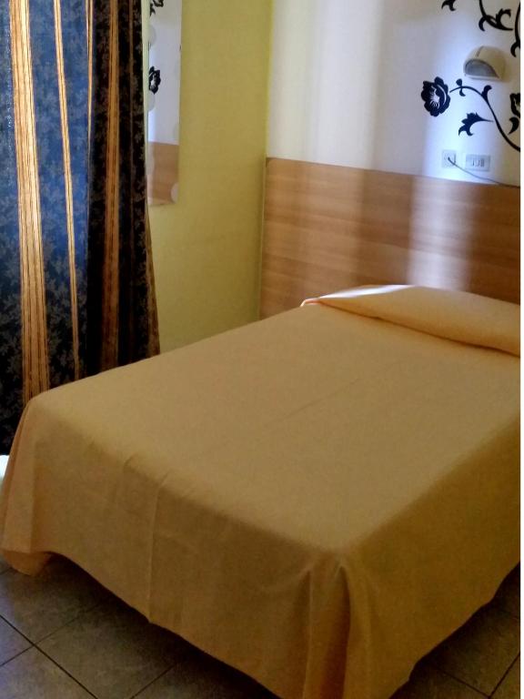 Postel nebo postele na pokoji v ubytování Hotel Stazione