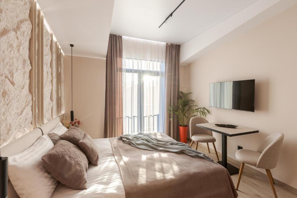 TV a/nebo společenská místnost v ubytování ACCENT Apart-Hotel