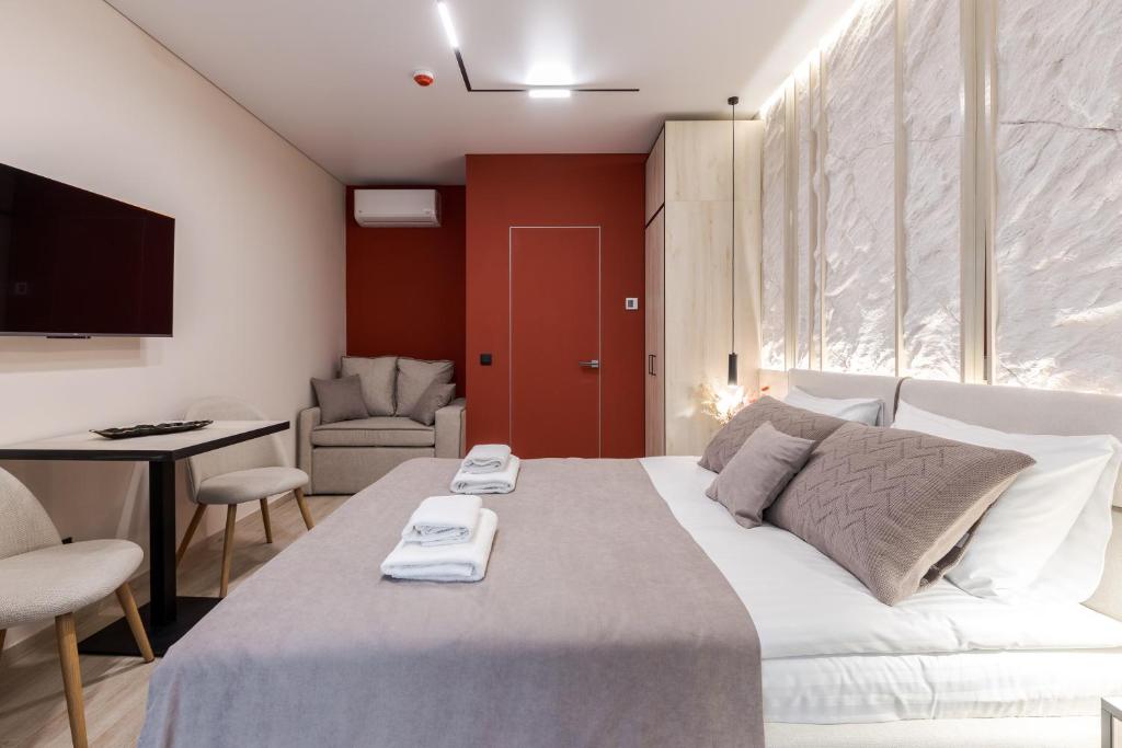 Postel nebo postele na pokoji v ubytování ACCENT Apart-Hotel