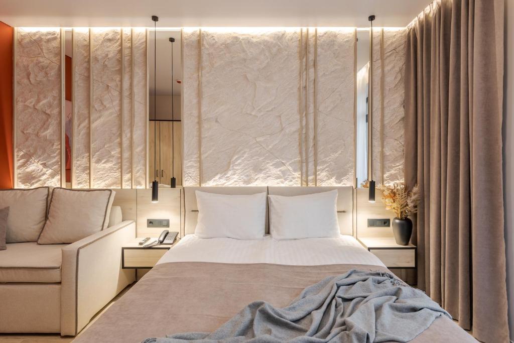 Postel nebo postele na pokoji v ubytování ACCENT Apart-Hotel