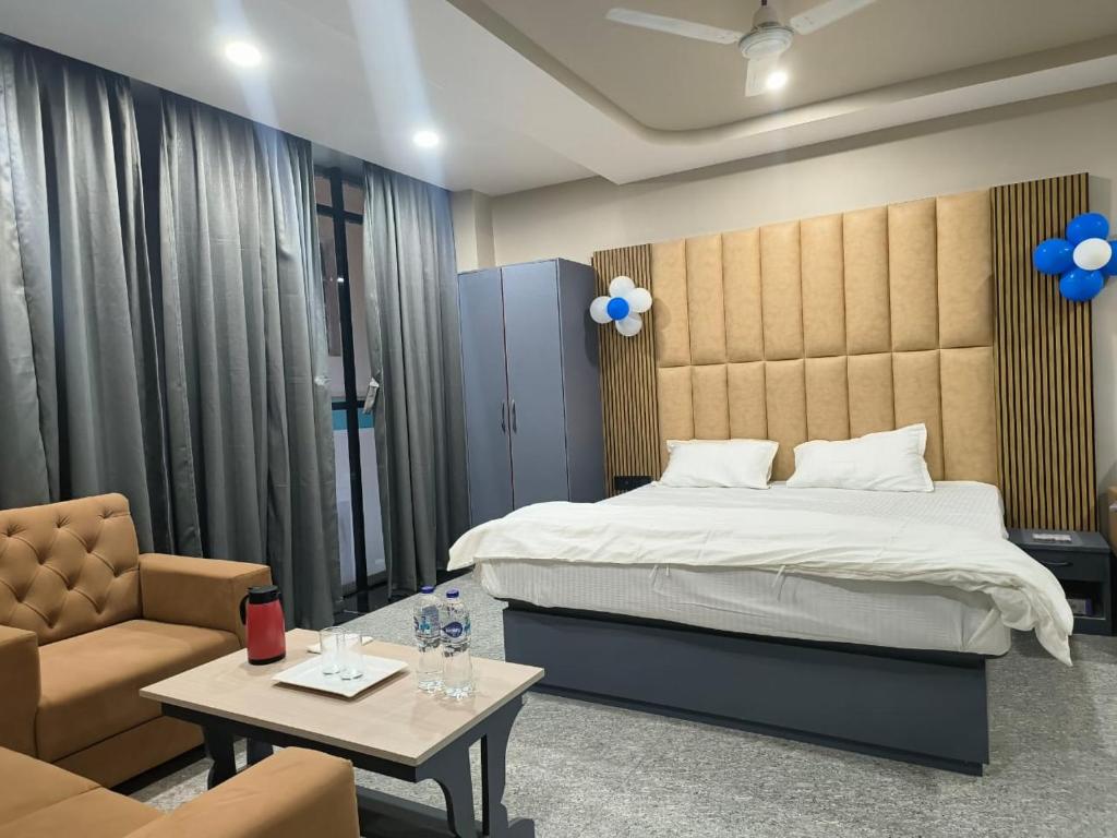 Katil atau katil-katil dalam bilik di Hotel Ganesha - residential