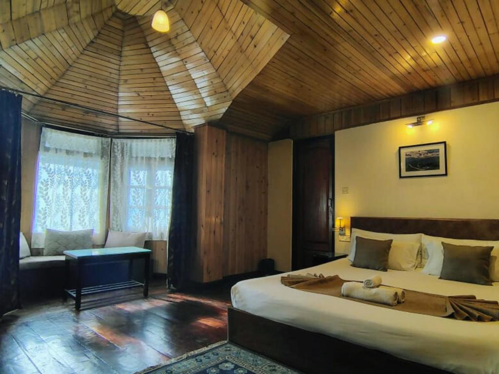 Postel nebo postele na pokoji v ubytování Villa Everest