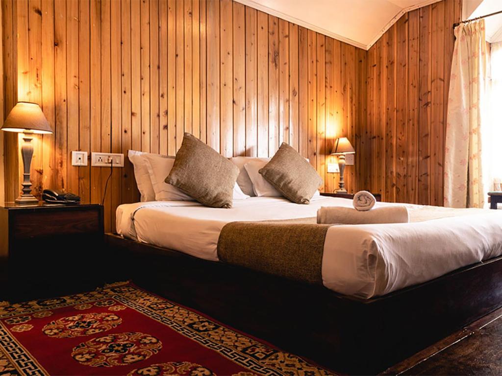 Postel nebo postele na pokoji v ubytování Villa Everest