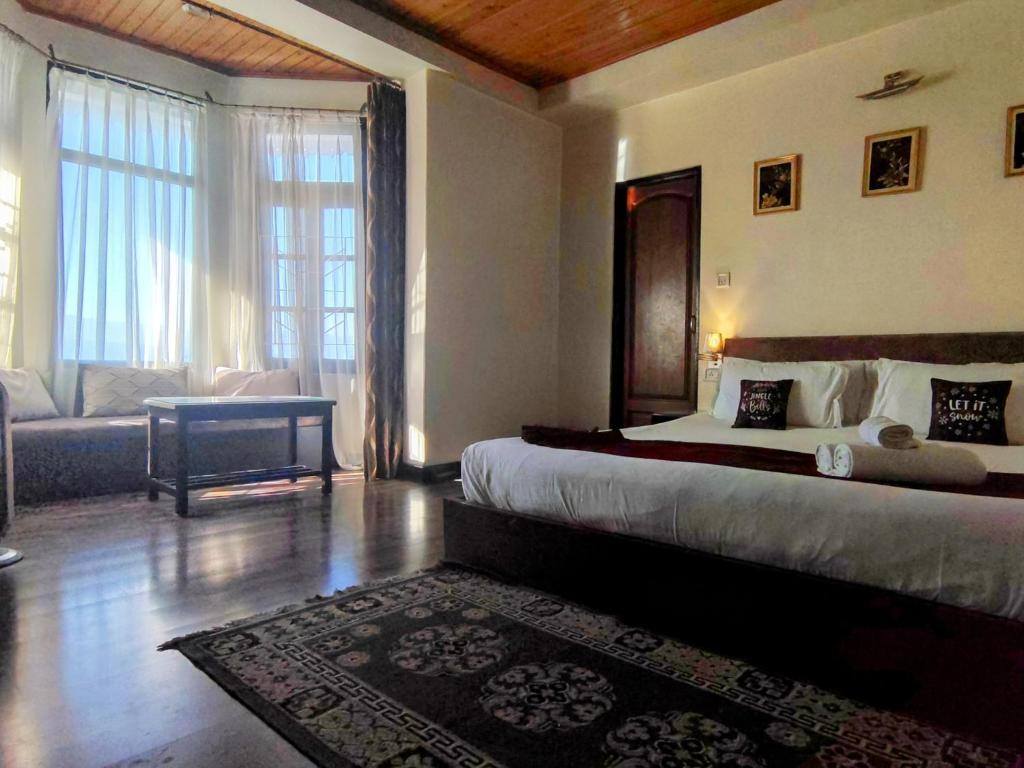 Postel nebo postele na pokoji v ubytování Villa Everest