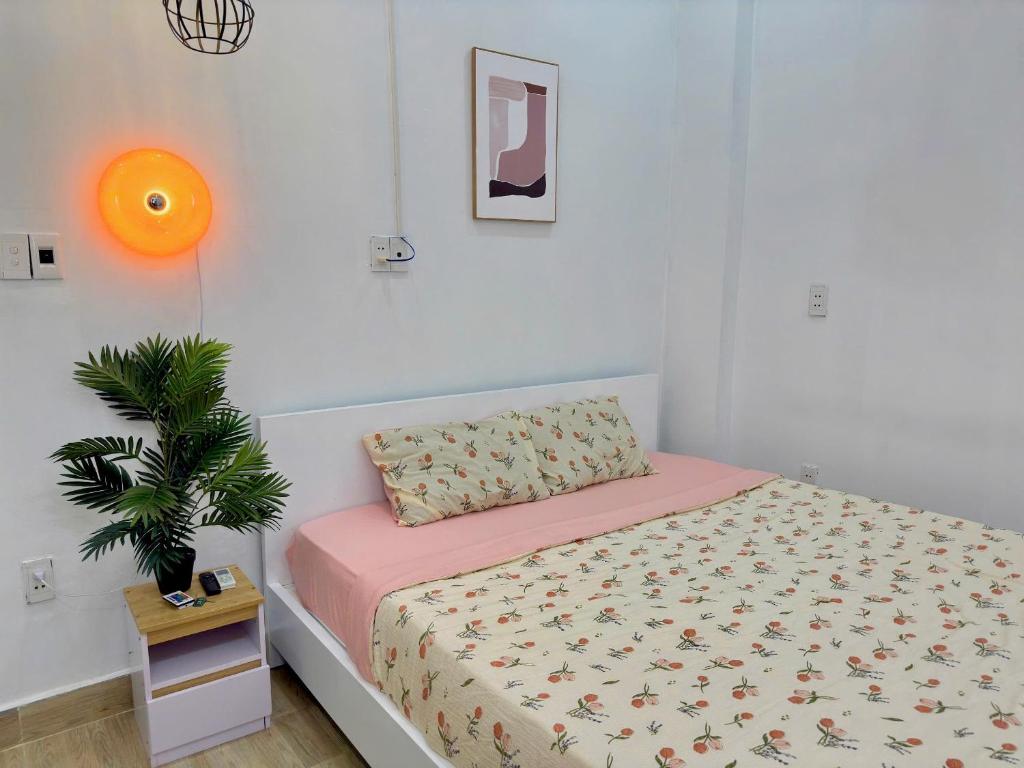 Postel nebo postele na pokoji v ubytování Corgi House Beachstay Danang